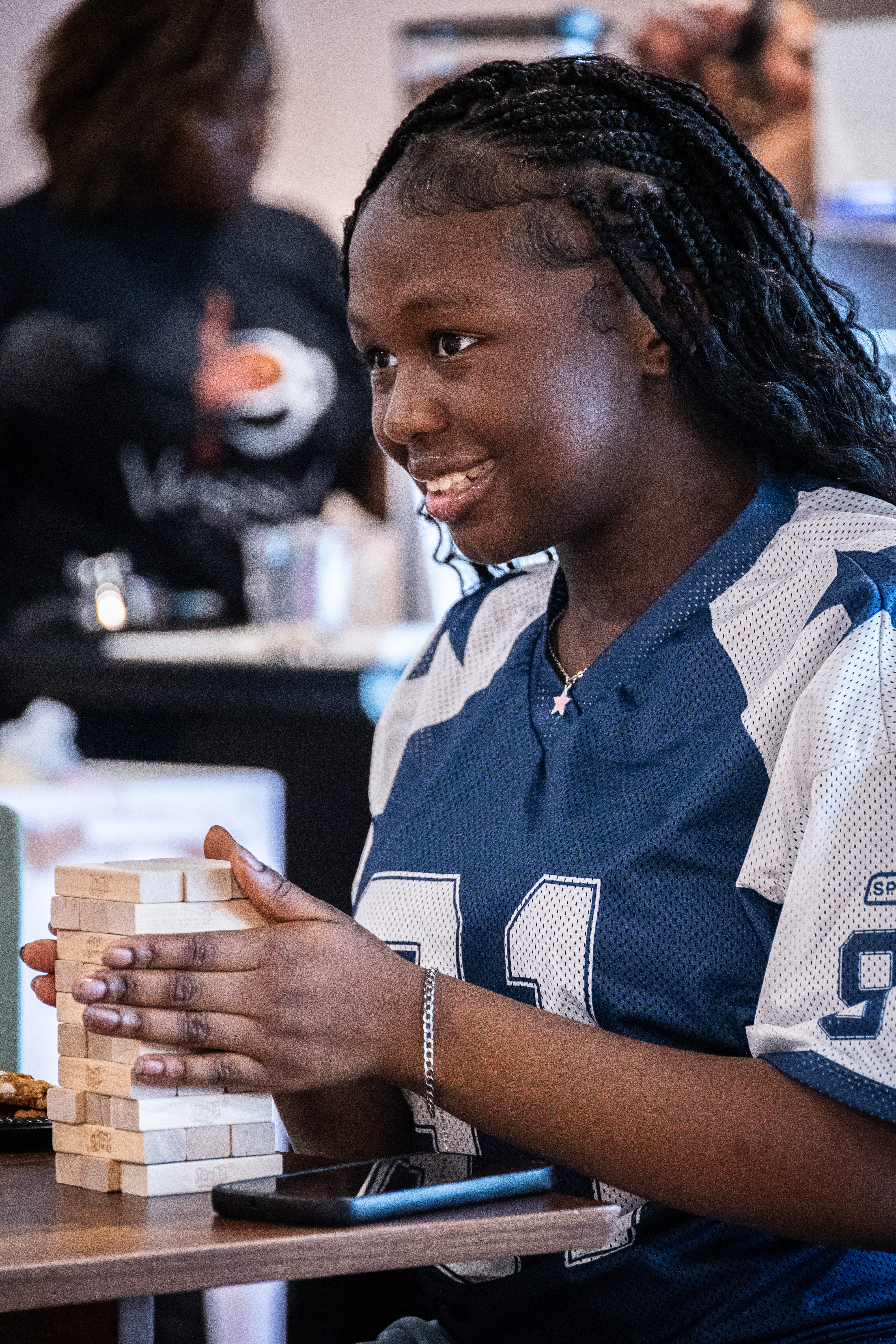 Launch Party guests playing Jenga